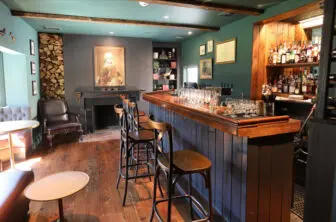 The cozy bar at The Bird & Bottle