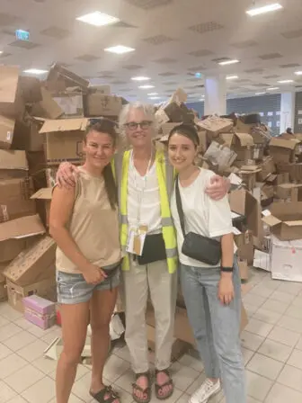 Gretchen Dykstra (center) with two Polish volunteers