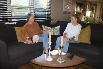 Debbie Darman and Pauline Minners visit at Darman's home.