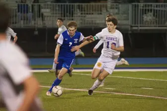 Haldane's Clem Grossman (7) gets a step on a Rhinebeck defender on Wednesday.(Photo by S. Pearlman)