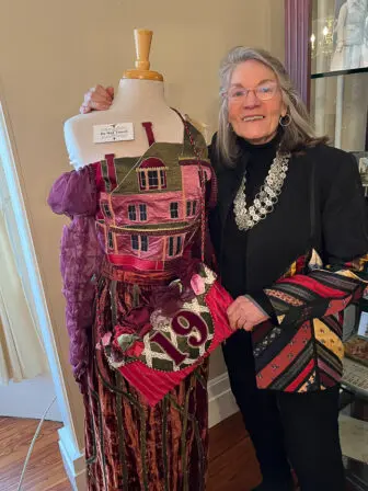 Shirley Botsford with a dress she created that was inspired by her homePhoto by A. Rooney