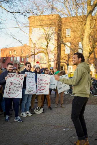 Veekas Ashoka of Beacon Climate Action Now speaks at a rally at Polhill Park on Monday (March 20) before the council vote.Photo by Valerie Shively.