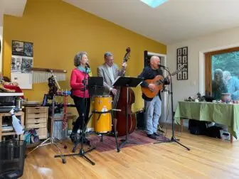 The Lake Trio played in Sandy McKelvey's house in 2022.