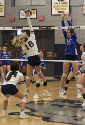 Lila Burke (18) sends the ball over the net in Beacon's 3-1 victory over Valley Central on Wednesday.