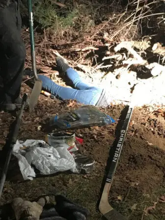 Only Michelle Starchilli's legs were visible as she dug in 2018 to rescue a dachsund trapped underground. Photoprovided