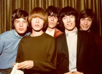 1964: Rock and roll band "The Rolling Stones" pose for a portrait in 1964. (L-R) Mick Jagger, Brian Jones, Keith Richards, Bill Wyman, Charlie Watts. (Photo by Michael Ochs Archives/Getty Images)