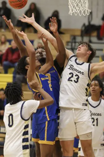 Jack Antalek (23) battles for a rebound.
