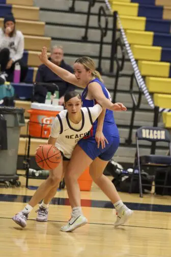Devaya Rodriguez drives past a Goshen defender during the Bulldog's win on Tuesday. (Photo by Cadence Heeter)