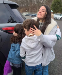 Addimando hugging her children after being released on Jan. 4 from a state prison inWestchester County. (Nicole Addimando Community Defense Committee)