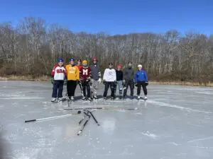 Philipstown pond hockey players posed during one of the good days this year. (Photo provided)