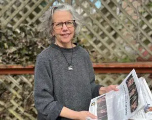 Alison Rooney, holding one of the last of her nearly 2,000 Current articles Photo by Brooke Phillips