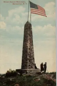 An early postcard of the Beacon Monument with the flagpole that in 1934 acted as a lightning rod (Beacon Historical Society)