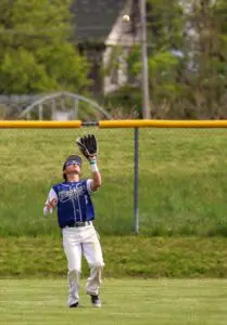 Jackson Atwell waits for a fly ball during the Beacon Bash tournament on April 27.Photo by Cadence Heeter