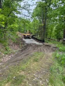 Work began this month on an access road to a cell tower planned in Nelsonville adjacent to the Cold Spring Cemetery.Photo provided