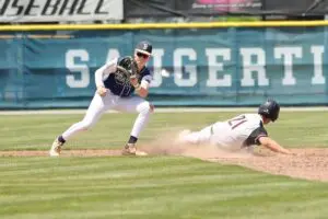 Zack Schetter waits for the ball as a Marlboro runner slides into second during the title game on May 25. Photo by Allyse Pulliam/USA Today
