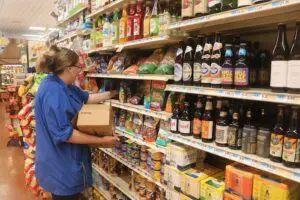 Mackenzie Faitak stocks shelves atFoodtown.