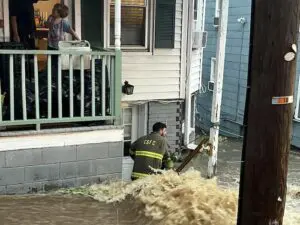 A Cold Spring Fire Co. volunteer fights the floodwaters on July 9, 2023. (File photo)
