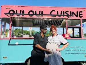 Georges and Laura Goba-Byrne with their Oui Oui Cuisine food truck (Photo provided)