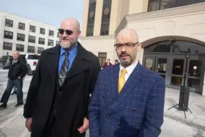 Andrew Krivak (right) and Anthony DiPippo outside the Putnam County Courthouse in February 2023 after a jury acquitted Krivak. Photo by Seth Harrison/ The Journal News