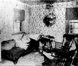 A photo from the Matteawan Journal
shows the sitting room where Abe Seaman’s body was found. Police accused his wife of killing him.