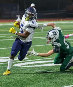 Elijah Epps slips past a Spackenkill defender during the Bulldogs' upset win on Nov. 1.