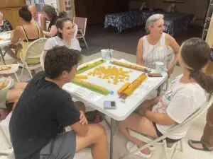 Clockwise from left: Abe Spodek, Roberta Goldman, Alison Spodek and Lucinda Arginsky play mahjong at the Beacon Hebrew Alliance. Photo by J. Asher