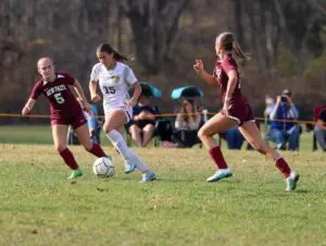 Drew Kelly (15) advances the ball against New Paltz in a tournament game on Oct. 30.