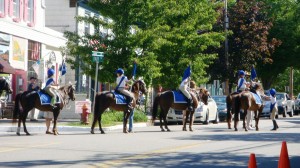 On horse back