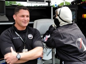 Ari and Molly - Grand-Am Race at Lime Rock - Molly on crew handling fuel