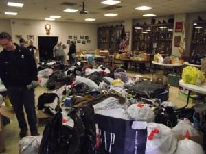 The Cold Spring Firehouse room, filled with donations, empties out as the trucks are filled.Photo by Linda Milne Speziale