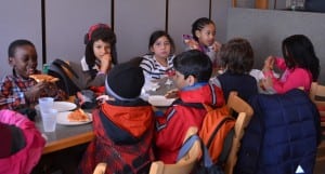 Community Roots second-graders enjoy pizza at Cold Spring Pizza on Jan. 17.Photo by Jeanne Tao