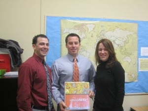 Sixth-grade team members Tom Virgadamo, left, Mark Wick and Kim McCollum, with Second Step material Photo by A. Rooney