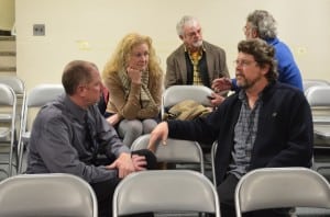 Mayoral candidate Ralph Falloon speaks with members of the audience after the March 13 candidates forum. Photo by Jeanne Tao