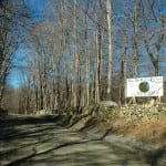 A sign on Old Albany Post Road, north of the area slated for work, displays anti-paving sentiments. Photo by L.S. Armstrong