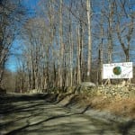 A sign on Old Albany Post Road, north of the area slated for work, displays anti-paving sentiments. Photo by L.S. Armstrong