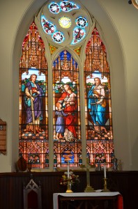 The main window at the United Methodist Church of South Highland depicts Faith, Hope and Charity.