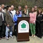 Edgar Masters, left, George Pataki, Bob Tendy, Bob Bickford, Barbara Scuccimarra, Andy Beers, Dr. Lucy Waletzky, Erik Kulleseid, Libby Pataki, MaryEllen Odell, Fred Osborn III and Katrina Shindledecker gathered on April 26 to celebrate and draw attention to the renovations underway as well as the need for further fundraising. Photo courtesy of NYS Parks Taconic Region