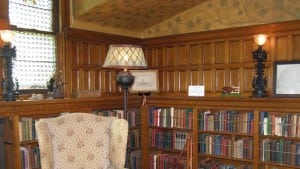 Fine woodwork, stained glass, and a collection of many first edition books inspire in the Wilderstein library.
