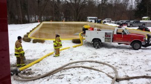Local fire department volunteers fill the new rink.