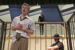 Eric Rizzi, foreground, rehearsing on the set with Lucy Austin and Tyler Mell. (Photo by Jim Mechalakos)