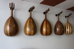 A display of ouds lines a wall at Lord of the Strings.
