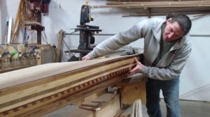 Bernie Kohler works on one of CSCK's "everything from scratch" cedar strip sea kayaks.