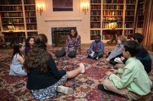 First Lady Michelle Obama participates in a Kid Reporter gaggle in the White House Library during the annual Easter Egg Roll on the South Lawn of the White House, April 21. Zack Shannon, 10, second child pictured on right of the First Lady, and Clara Tripp, second child pictured at left, live in Garrison. (Official White House Photo by Lawrence Jackson)