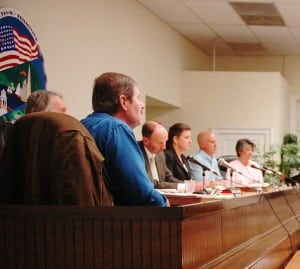 Town Board members listen during proceedings April 3; from left: Councilors Mike Leonard and Dave Merandy, Supervisor Richard Shea, Councilors Nancy Montgomery and John Van Tassel, with Town Clerk Tina Merando. Photo by L.S. Armstrong