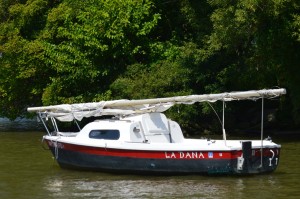 La Dana, a small sailboat anchored offshore at Cold Spring for the past several months, has sparked curiosity among village residents. (Photo by M. Turton)