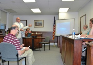 At the Putnam County Legislature's Physical Services Committee meeting, Vinny Tamagna presents the concept for use of space at a redeveloped Butterfield complex. (Photo by L.S. Armstrong)