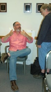 Richard Butensky talks to Mary Finger, Planning Board member, after the Aug. 7 Town Board meeting. Photo by L.S. Armstrong