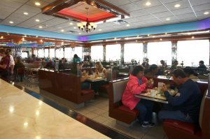 Booths, counters, tables — all part of the Yankee Clipper interior.