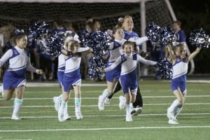 The Philipstown Hawks Cheer Squad takes the field during halftime at the Haldane Homecoming game on Sept. 26.