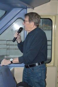Licensed tour guide Paul Rush provides commentary along the cruise route.